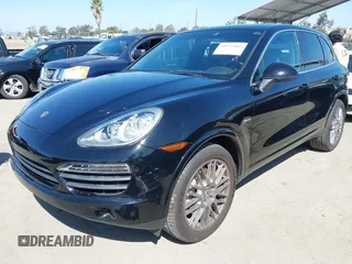 2012 Porsche Cayenne S Hybrid with VIN WP1AE2A23CLA93096, listed as a IAAI auction lot 41972843 with 79,139 mi miles. Bid and sale history available at carsss.com. Image 18.