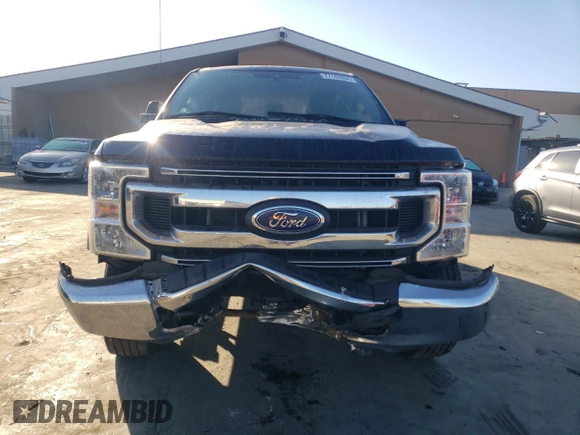 2021 Ford Super Duty F-250 SRW XL with VIN 1FT7X2BN0MEC62141, listed as a Copart auction lot 77142804 with 59,933 mi miles and Salvage Title. Bid and sale history available at carsss.com. Image 5.