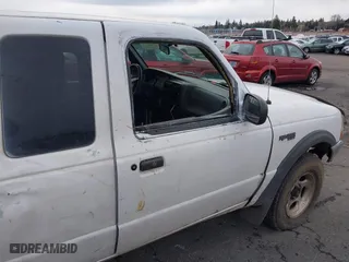 1999 Ford Ranger XLT with VIN 1FTZR15XXXTA09502, listed as a IAAI auction lot 41794904 with 203,276 mi miles. Bid and sale history available at carsss.com. Image 13.