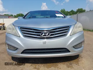 2012 Hyundai Azera z VIN KMHFH4JGXCA182208, wystawiony jako IAAI lot #42559319 z przebiegiem 236 086 mil mil oraz . Historia ofert i sprzedaży dostępna na DreamBid. Obrazek 19.