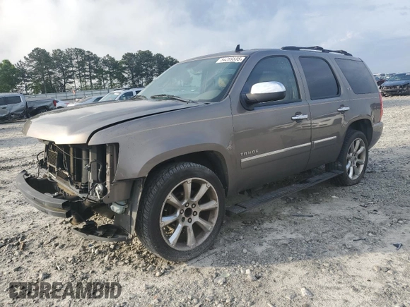 2012 Chevrolet Tahoe LTZ with VIN 1GNSCCE0XCR110507, listed as a Copart auction lot 54269535 with 193,499 mi miles and Salvage title. Bid and sale history available at DreamBid. Image 1.
