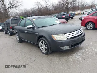 2008 Ford Taurus Limited with VIN 1FAHP25W68G156477, listed as a IAAI auction lot 41491743 with 218,523 mi miles. Bid and sale history available at carsss.com. Image 1.