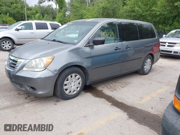 2009 Honda Odyssey LX with VIN 5FNRL38269B043326, listed as a IAAI auction lot 42872714 with 235,087 mi miles and . Bid and sale history available at DreamBid. Image 2.