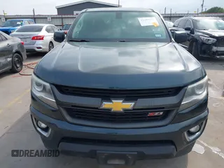2017 Chevrolet Colorado z VIN 1GCHSDEA4H1201640, wystawiony jako IAAI lot #42299847 z przebiegiem 105 647 mil mil oraz . Historia ofert i sprzedaży dostępna na DreamBid. Obrazek 13.