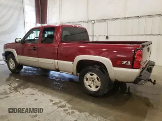 2005 Chevrolet Silverado 1500 Z71 with VIN 1GCEK19B65Z320601, listed as a Copart auction lot 52506345 with 169,157 mi miles and Salvage Title. Bid and sale history available at DreamBid. Image 2.