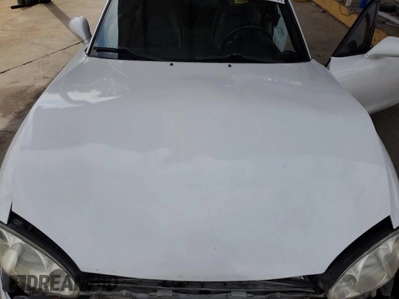 2004 Mazda MX-5 Miata LS z VIN JM1NB353640407864, wystawiony jako Copart lot #53951315 z przebiegiem 116 295 mil mil oraz Szkoda całkowita • Salvage title. Historia ofert i sprzedaży dostępna na DreamBid. Obrazek 11.