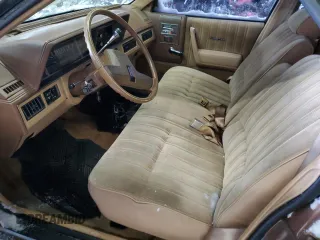 1986 Oldsmobile Cutlass z VIN 2G3AJ19R6G9345283, wystawiony jako Copart lot #41680155 z przebiegiem 30 900 mil mil oraz Tytuł czysty. Historia ofert i sprzedaży dostępna na DreamBid. Obrazek 7.