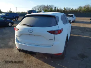 2017 Mazda CX-5 Touring with VIN JM3KFBCL8H0136601, listed as a IAAI auction lot 41830355 with 113,677 mi miles. Bid and sale history available at carsss.com. Image 4.