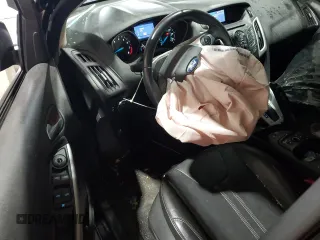 2013 Ford Focus SE with VIN 1FADP3F21DL348827, listed as a Copart auction lot 63589405 with 144,156 mi miles and Salvage title. Bid and sale history available at DreamBid. Image 8.