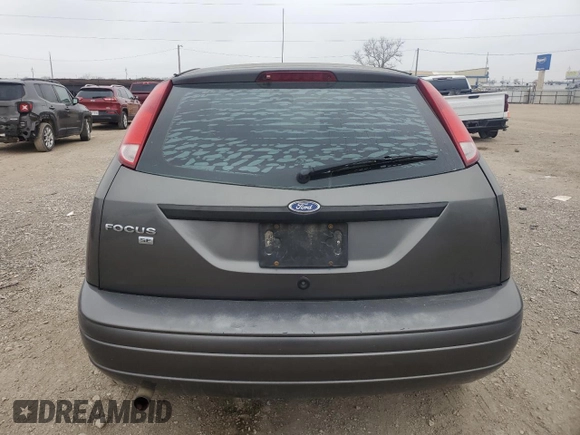 2007 Ford Focus S with VIN 1FAFP31N87W226088, listed as a Copart auction lot 88584555 with 83,896 mi miles and Salvage Title. Bid and sale history available at DreamBid. Image 6.