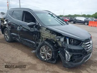 2014 Hyundai Santa Fe with VIN 5XYZUDLB6EG138885, listed as a IAAI auction lot 42333077 with 72,005 mi miles and . Bid and sale history available at DreamBid. Image 1.
