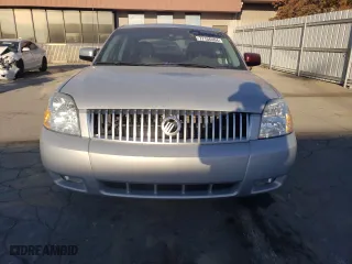 2005 Mercury Montego Premier with VIN 1MEFM43165G608323, listed as a Copart auction lot 77156404 with 138,150 mi miles and Salvage Title. Bid and sale history available at carsss.com. Image 5.