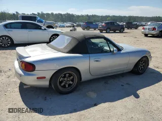 1999 Mazda MX-5 Miata z VIN JM1NB3538X0112611, wystawiony jako Copart lot #54732095 z przebiegiem 173 763 mil mil oraz Szkoda całkowita • Salvage title. Historia ofert i sprzedaży dostępna na DreamBid. Obrazek 3.