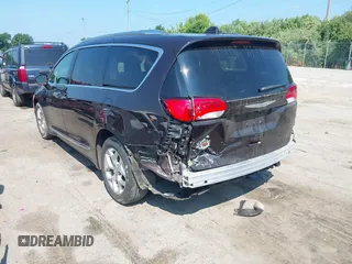 2018 Chrysler Pacifica Touring L Plus with VIN 2C4RC1EG2JR314847, listed as a IAAI auction lot 42716082 with 92,544 mi miles and . Bid and sale history available at DreamBid. Image 3.