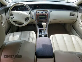 2001 Toyota Avalon XL z VIN 4T1BF28B91U155354, wystawiony jako Copart lot #52393885 z przebiegiem 277 545 mil mil oraz Szkody całkowita. Historia ofert i sprzedaży dostępna na DreamBid. Obrazek 8.