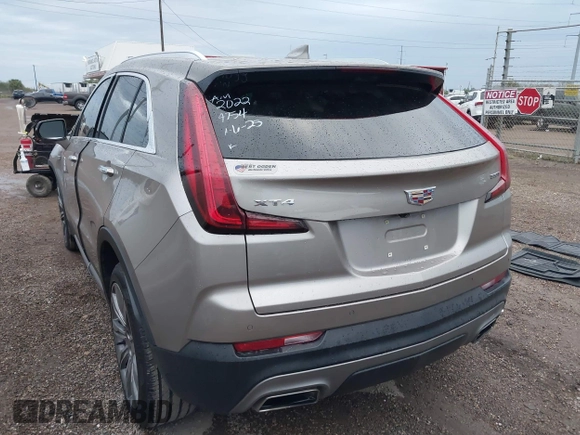 2022 Cadillac XT4 FWD Premium Luxury with VIN 1GYFZCR45NF164754, listed as a IAAI auction lot 41278705 with 65,698 mi miles. Bid and sale history available at carsss.com. Image 3.