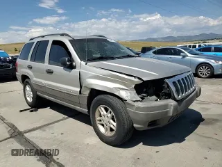 2003 Jeep Grand Cherokee Laredo with VIN 1J4GW48S23C524693, listed as a Copart auction lot 64461755 with 243,936 mi miles and Salvage title. Bid and sale history available at DreamBid. Image 15.