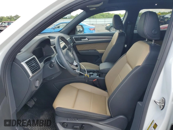 2023 Volkswagen Atlas SEL with VIN 1V2BE2CA4PC216788, listed as a Copart auction lot 65115764 with 13,033 mi miles and Salvage title. Bid and sale history available at DreamBid. Image 7.