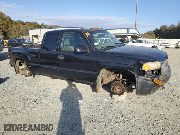 2003 GMC Sierra Denali z VIN 2GTFK69U031261036, wystawiony jako Copart lot #75353324 z przebiegiem 192 762 mil mil oraz Szkody całkowita. Historia ofert i sprzedaży dostępna na DreamBid. Obrazek 4.