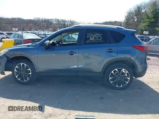 2016 Mazda CX-5 Grand Touring z VIN JM3KE4DY6G0785255, wystawiony jako IAAI lot #41887066 z przebiegiem 171 334 mil mil oraz . Historia ofert i sprzedaży dostępna na DreamBid. Obrazek 15.