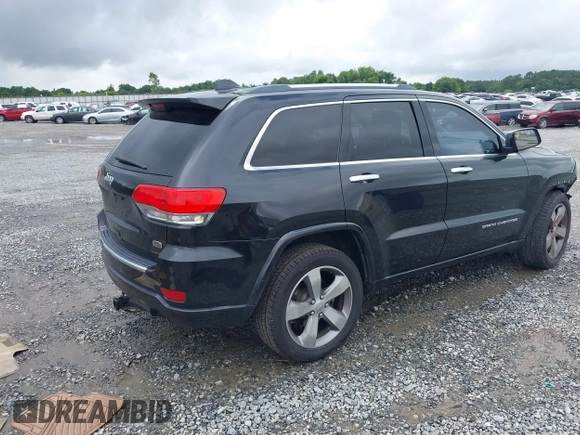 2015 Jeep Grand Cherokee Overland with VIN 1C4RJECG3FC152601, listed as a IAAI auction lot 42414340 with 139,315 mi miles and . Bid and sale history available at DreamBid. Image 4.