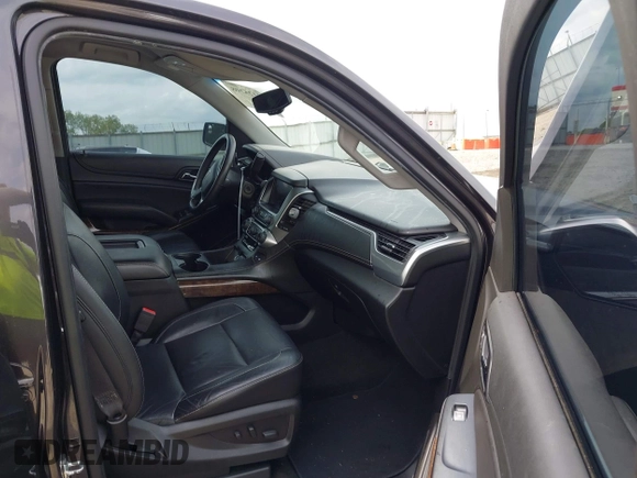 2018 Chevrolet Tahoe LT with VIN 1GNSKBKCXJR103730, listed as a IAAI auction lot 42125208 with 212,360 mi miles and . Bid and sale history available at DreamBid. Image 5.