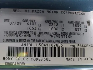 2010 Mazda Mazda3 s Grand Touring with VIN JM1BL1H50A1187855, listed as a IAAI auction lot 41981316 with 198,618 mi miles. Bid and sale history available at carsss.com. Image 9.