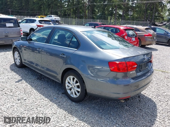 2013 Volkswagen Jetta SE with VIN 3VWDP7AJ3DM372896, listed as a IAAI auction lot 42520685 with 127,143 mi miles and . Bid and sale history available at DreamBid. Image 3.