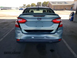 2012 Ford Focus SE with VIN 1FAHP3F23CL263018, listed as a Copart auction lot 55975335 with 167,823 mi miles and Salvage title. Bid and sale history available at DreamBid. Image 6.