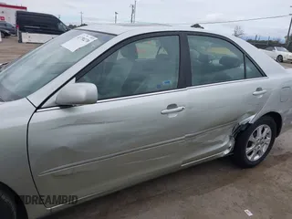 2005 Toyota Camry LE with VIN JTDBF30K650163057, listed as a IAAI auction lot 41730270 with 98,300 mi miles and . Bid and sale history available at DreamBid. Image 14.