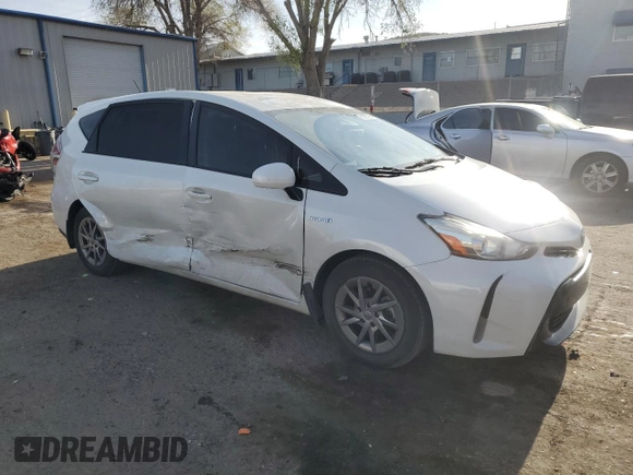 2015 Toyota Prius Two with VIN JTDZN3EU5FJ025839, listed as a Copart auction lot 50097265 with 106,328 mi miles and Salvage Title. Bid and sale history available at DreamBid. Image 4.