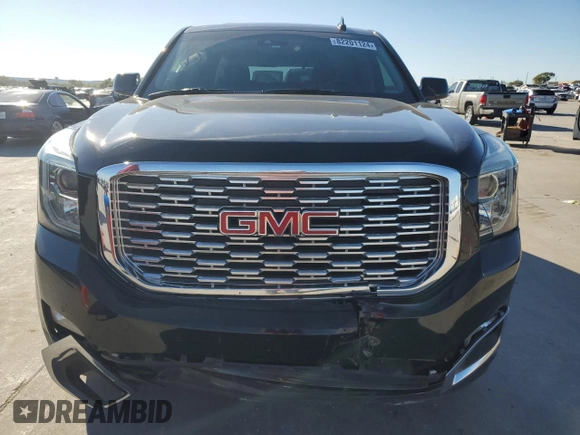 2019 GMC Yukon Denali with VIN 1GKS2CKJ9KR186604, listed as a Copart auction lot 82201124 with 110,069 mi miles and Salvage Title. Bid and sale history available at DreamBid. Image 5.
