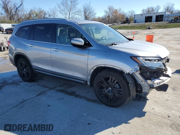 2019 Honda Pilot Elite with VIN 5FNYF6H0XKB059988, listed as a Copart auction lot 74472194 with 63,742 mi miles and Salvage title. Bid and sale history available at DreamBid. Image 4.