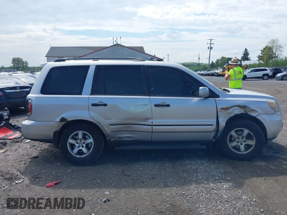2006 Honda Pilot EX-L with VIN 2HKYF18596H563583, listed as a IAAI auction lot 42183326 with 181,665 mi miles and . Bid and sale history available at DreamBid. Image 13.