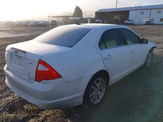 2012 Ford Fusion SEL with VIN 3FAHP0JG3CR254175, listed as a IAAI auction lot 41459968 with 191,831 mi miles. Bid and sale history available at carsss.com. Image 4.