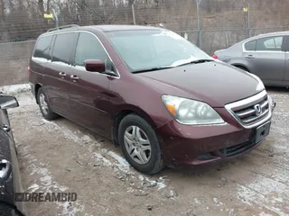 2007 Honda Odyssey EX-L with VIN 5FNRL38657B449372, listed as a IAAI auction lot 41508969 with 149,740 mi miles. Bid and sale history available at carsss.com. Image 1.