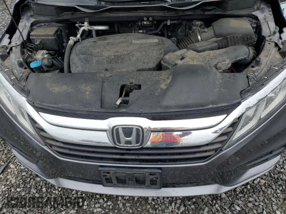 2018 Honda Odyssey EX z VIN 5FNRL6H56JB108661, wystawiony jako Copart lot #62807955 z przebiegiem 96 164 mil mil oraz Szkoda całkowita • Salvage title. Historia ofert i sprzedaży dostępna na DreamBid. Obrazek 12.