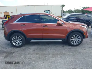2019 Cadillac XT4 FWD Premium Luxury with VIN 1GYFZCR41KF183507, listed as a IAAI auction lot 41987176 with 64,803 mi miles and . Bid and sale history available at carsss.com. Image 13.