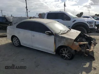 2013 Volkswagen Jetta SE with VIN 3VWDP7AJ7DM402692, listed as a Copart auction lot 51169345 with Not provided miles and Salvage title. Bid and sale history available at DreamBid. Image 4.