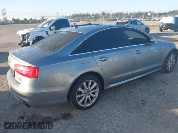 2013 Audi A6 3.0T Prestige with VIN WAUJGAFC6DN131821, listed as a IAAI auction lot 41411463 with 186,380 mi miles. Bid and sale history available at carsss.com. Image 4.