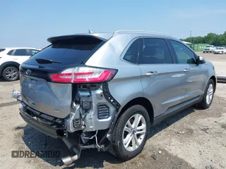 2020 Ford Edge SEL with VIN 2FMPK3J98LBA83828, listed as a IAAI auction lot 42585669 with 60,704 mi miles and . Bid and sale history available at DreamBid. Image 4.