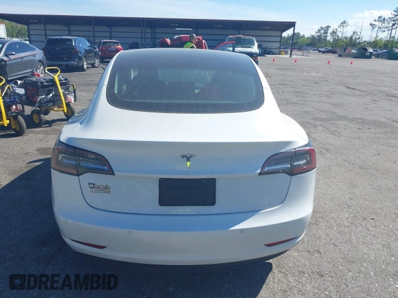 2019 Tesla Model 3 Mid Range with VIN 5YJ3E1EA7KF425127, listed as a IAAI auction lot 41886436 with 87,236 mi miles and . Bid and sale history available at carsss.com. Image 16.
