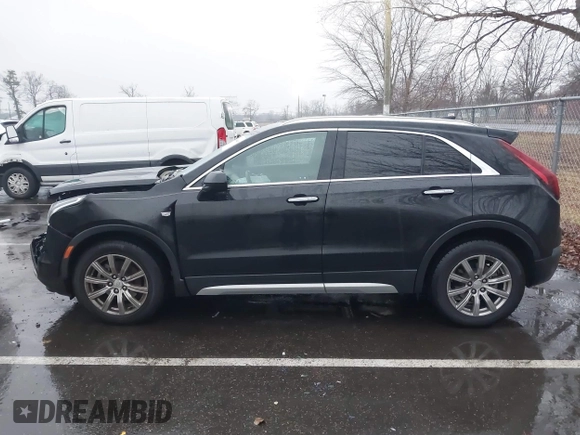 2019 Cadillac XT4 FWD Premium Luxury with VIN 1GYFZCR49KF211022, listed as a IAAI auction lot 41480403 with 43,040 mi miles and . Bid and sale history available at DreamBid. Image 14.