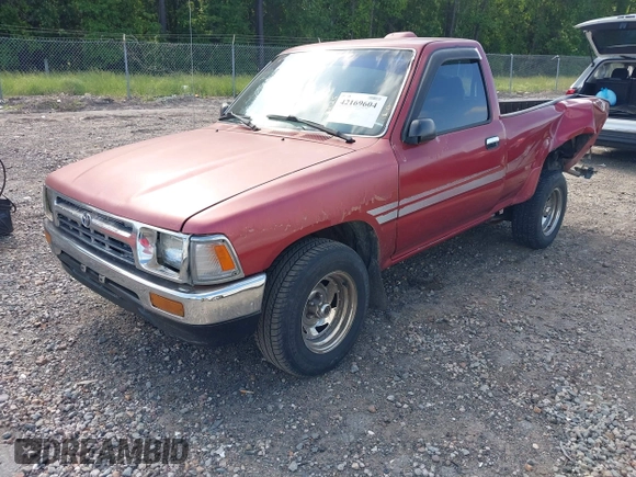 1994 Toyota Pickup DLX z VIN 4TARN81P1RZ276503, wystawiony jako IAAI lot #42169604 z przebiegiem 245 498 mil mil oraz . Historia ofert i sprzedaży dostępna na DreamBid. Obrazek 2.