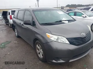 2015 Toyota Sienna L with VIN 5TDZK3DC9FS563593, listed as a IAAI auction lot 41466419 with 136,394 mi miles. Bid and sale history available at carsss.com. Image 1.