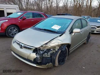 2007 Honda Civic Sdn LX with VIN 1HGFA16567L032980, listed as a IAAI auction lot 41171625 with 153,889 mi miles. Bid and sale history available at carsss.com. Image 6.