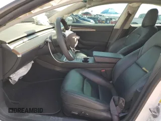 2021 Tesla Model 3 Performance z VIN 5YJ3E1EC1MF075451, wystawiony jako Copart lot #60354235 z przebiegiem 52 662 mil mil oraz Szkoda całkowita • Salvage title. Historia ofert i sprzedaży dostępna na DreamBid. Obrazek 7.