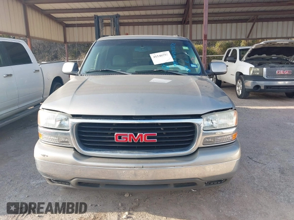 2003 GMC Yukon SLT with VIN 1GKEC13Z43R163266, listed as a IAAI auction lot 41540592 with 173,804 mi miles. Bid and sale history available at carsss.com. Image 6.