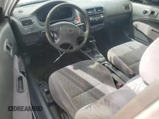 1999 Honda Civic DX with VIN 1HGEJ6223XL076584, listed as a Copart auction lot 51202925 with 282,306 mi miles and Salvage Title. Bid and sale history available at DreamBid. Image 8.