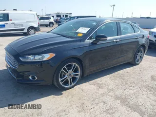 2016 Ford Fusion Titanium with VIN 3FA6P0D91GR237742, listed as a IAAI auction lot 41892627 with 73,616 mi miles and . Bid and sale history available at DreamBid. Image 2.